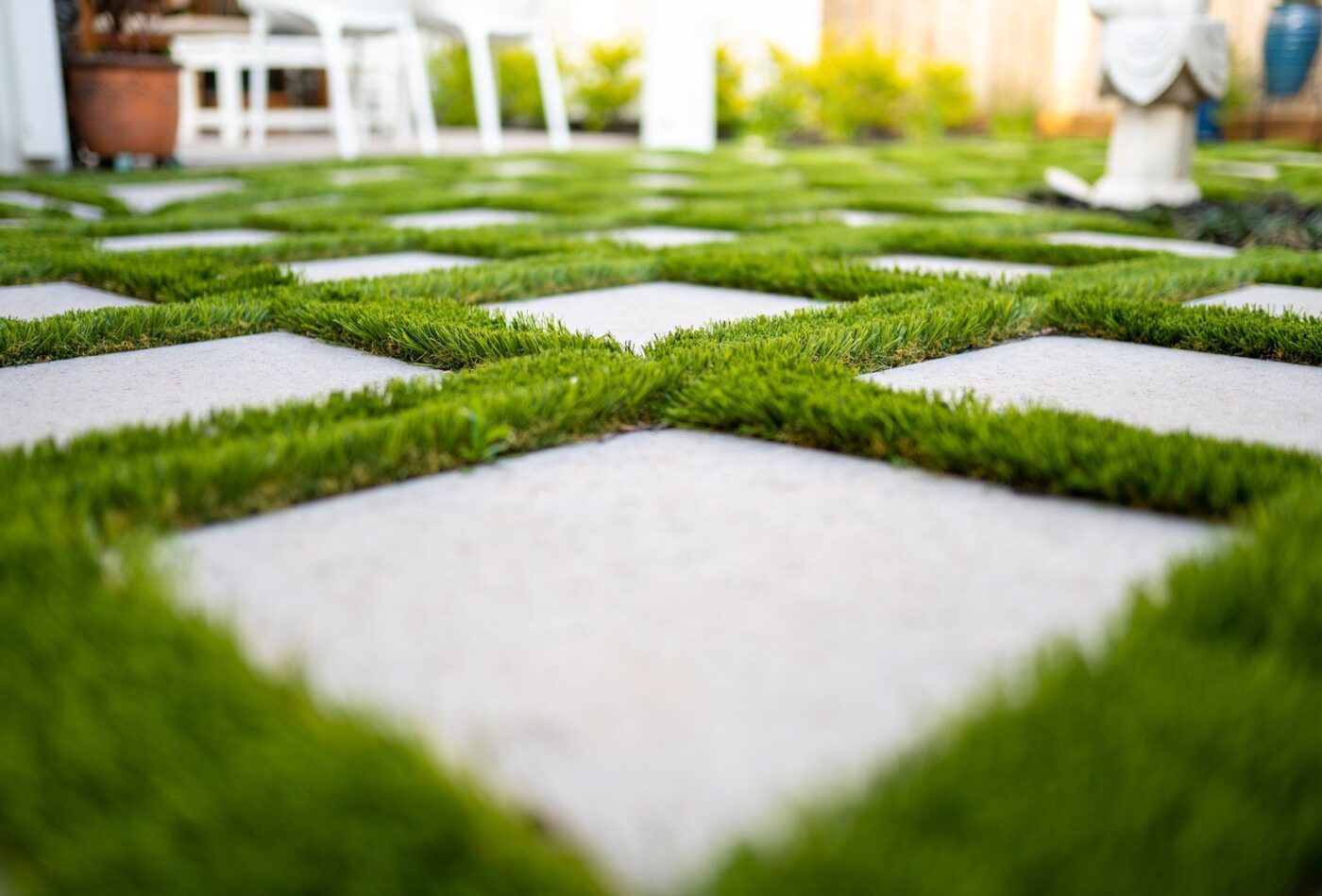 Marco Island, FL concrete and artificial grass driveway project by Naples Concrete Solutions