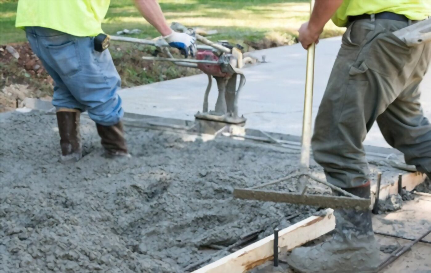 Vineyards, FL contractors leveling concrete poured into the frame