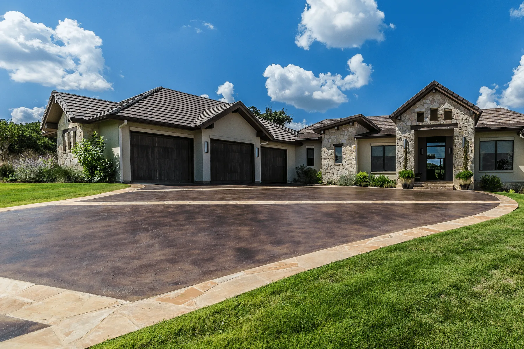 decorative concrete driveway done in a Naples FL property