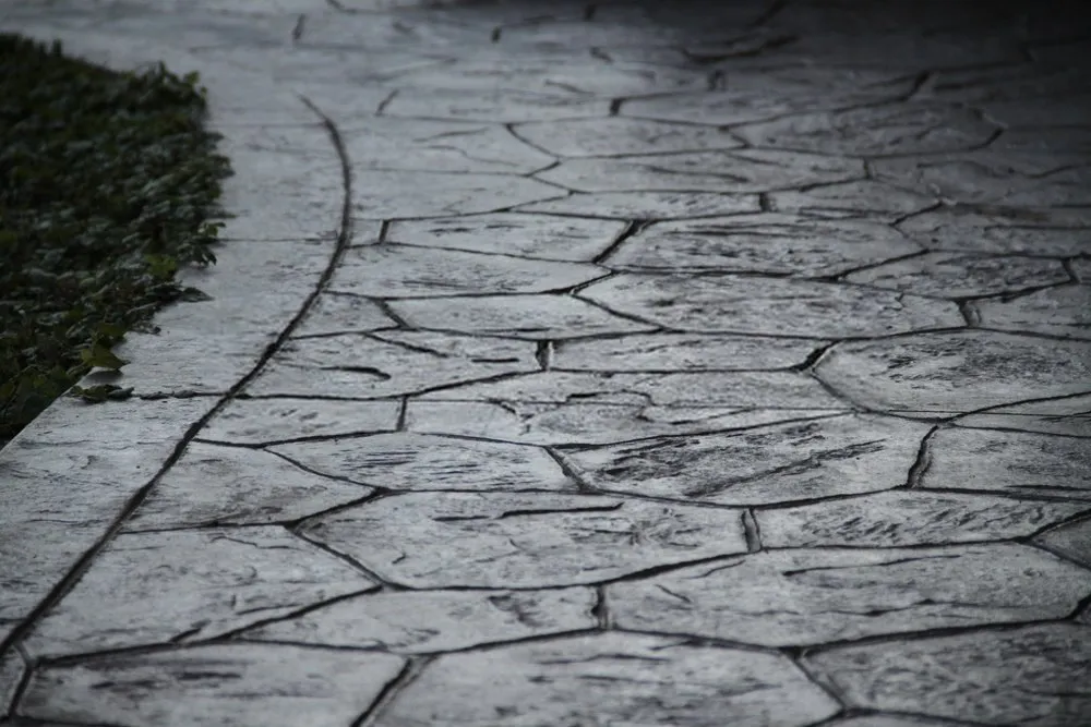customized stamping patterns by Naples Concrete Solutions for a driveway in Golden Gate, FL
