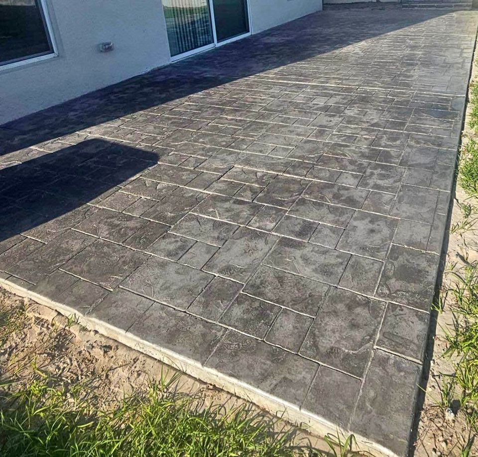personalized concrete patio stamping pattern in a Naples FL property